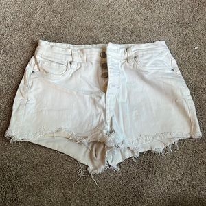 White distressed jean shorts
